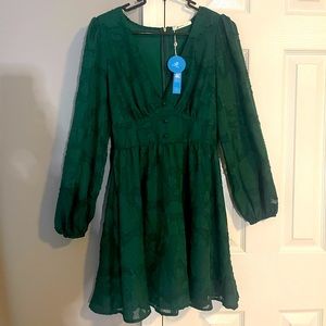 XS long sleeved forest green dress with floral pattern